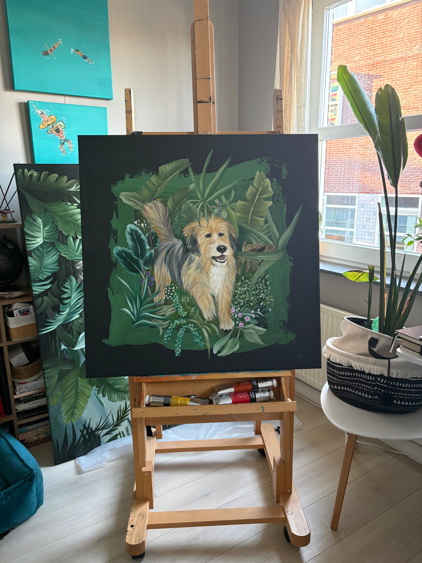 Pofu's portrait displayed on an easel in Ecem Naz Ust's studio